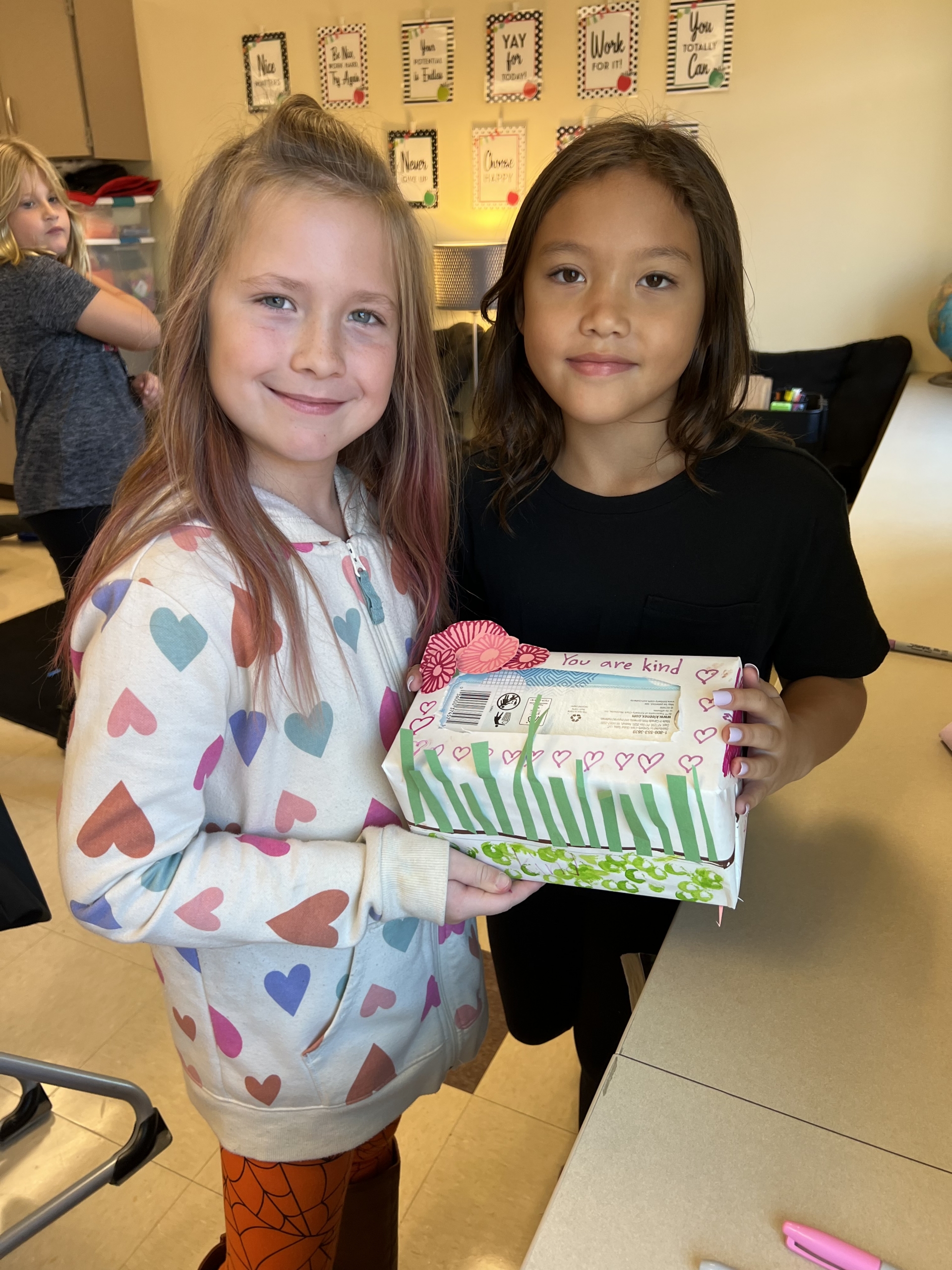 Mrs. Walters' class did a Spread the Joy Craft. They decorated Kleenex boxes and then they went to visit the Dyer nursing home.