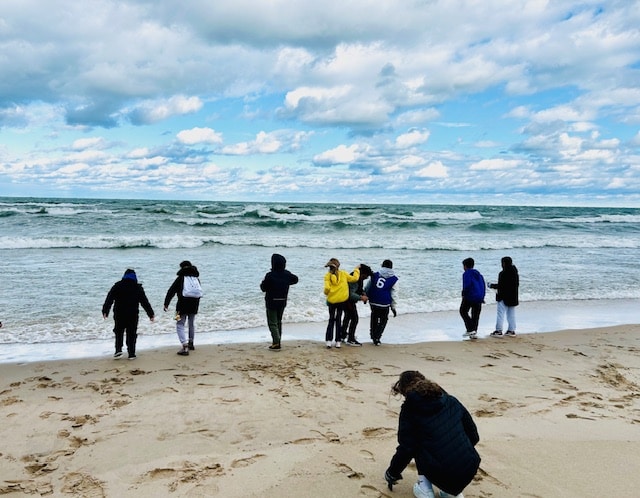 Fourth grade braved the cold wind and weather to explore the Dunes of West Beach. Students had fun running away from the tide that was chasing them, climbing the dunes, and learning about the native plants.