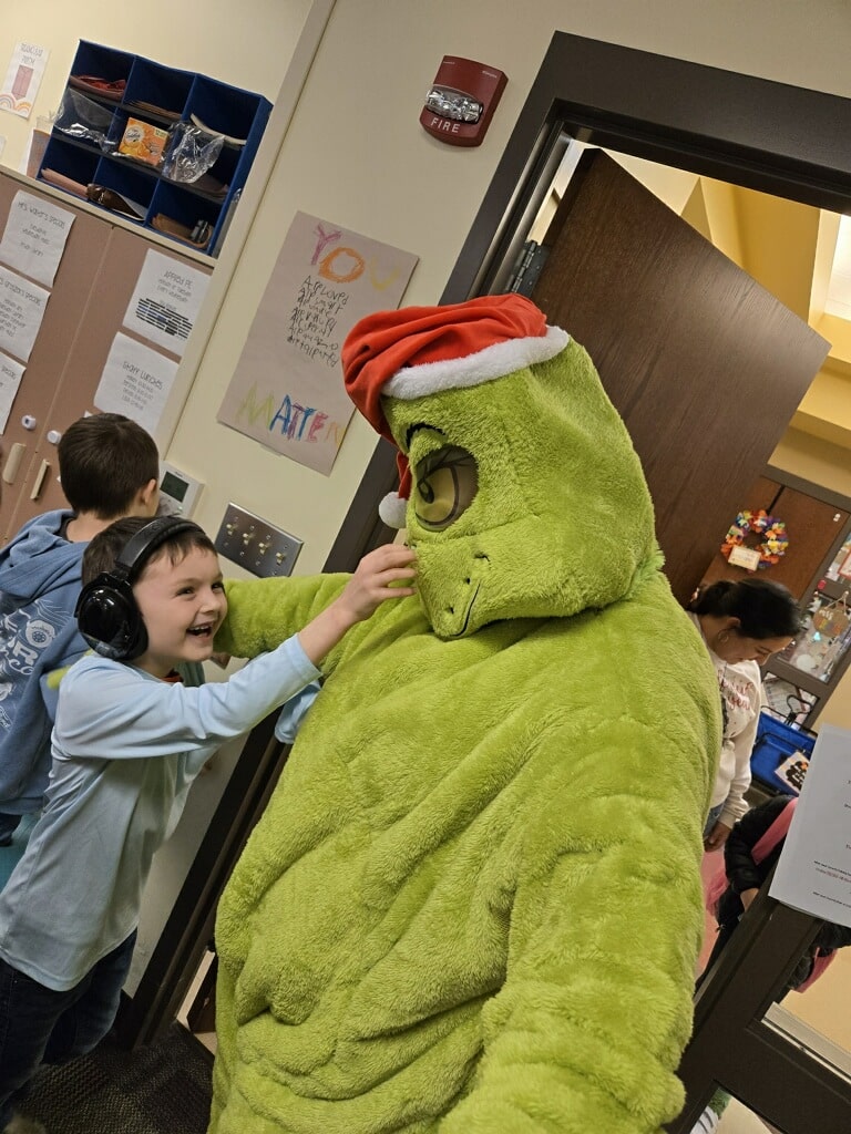 The Grinch was hanging around Protsman on Wednesday, December 18. He made many new friends!